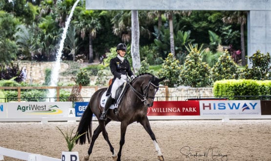 WD114640-Caroline Wagner and 'Penny Hill Park Sophia' score 70.833% to place second in the class WD114640-Caroline Wagner and 'Penny Hill Park Sophia' score 70.833% to place second in the class